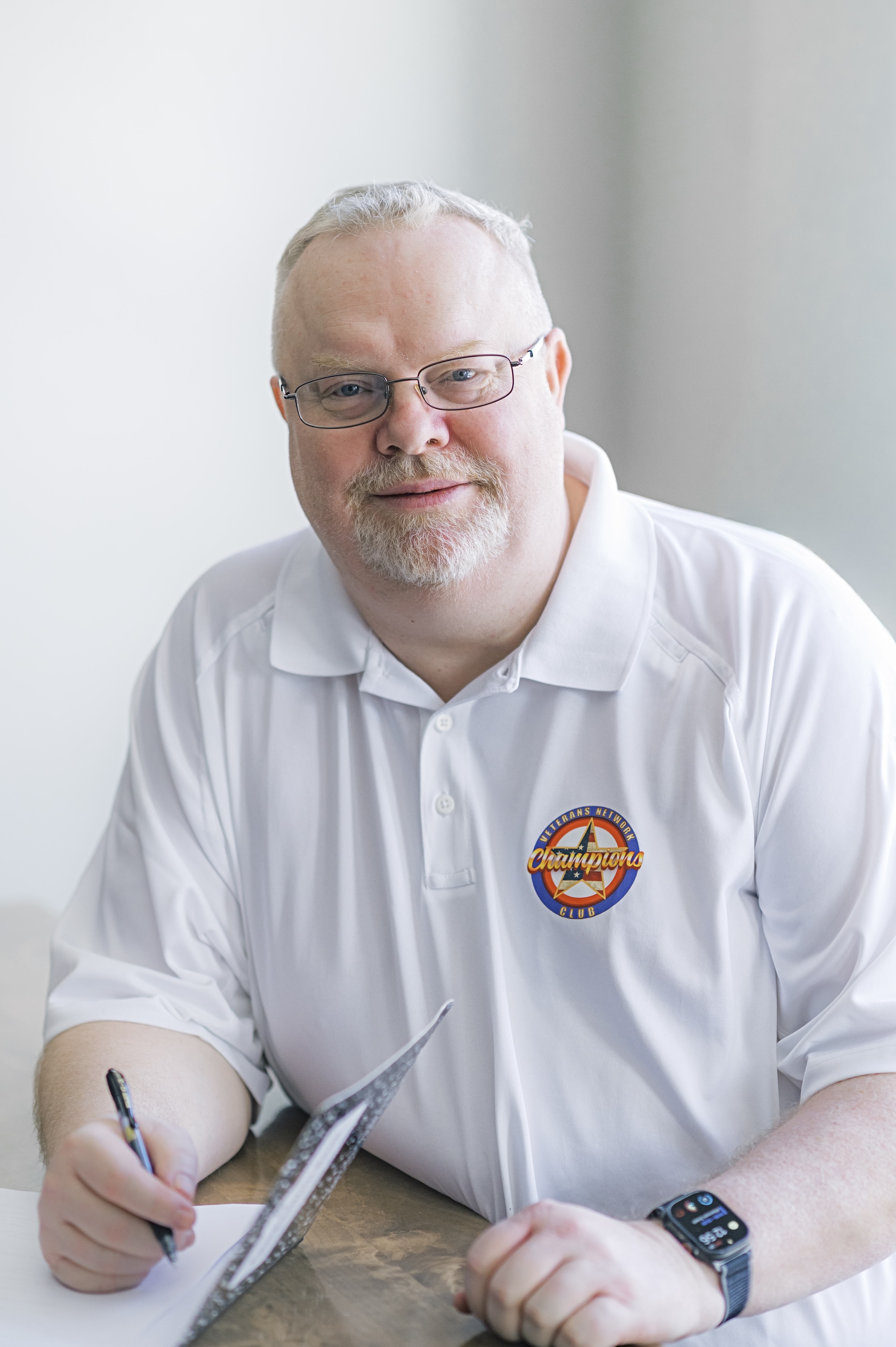 headshot picture of Brian with VNCC team shirt 