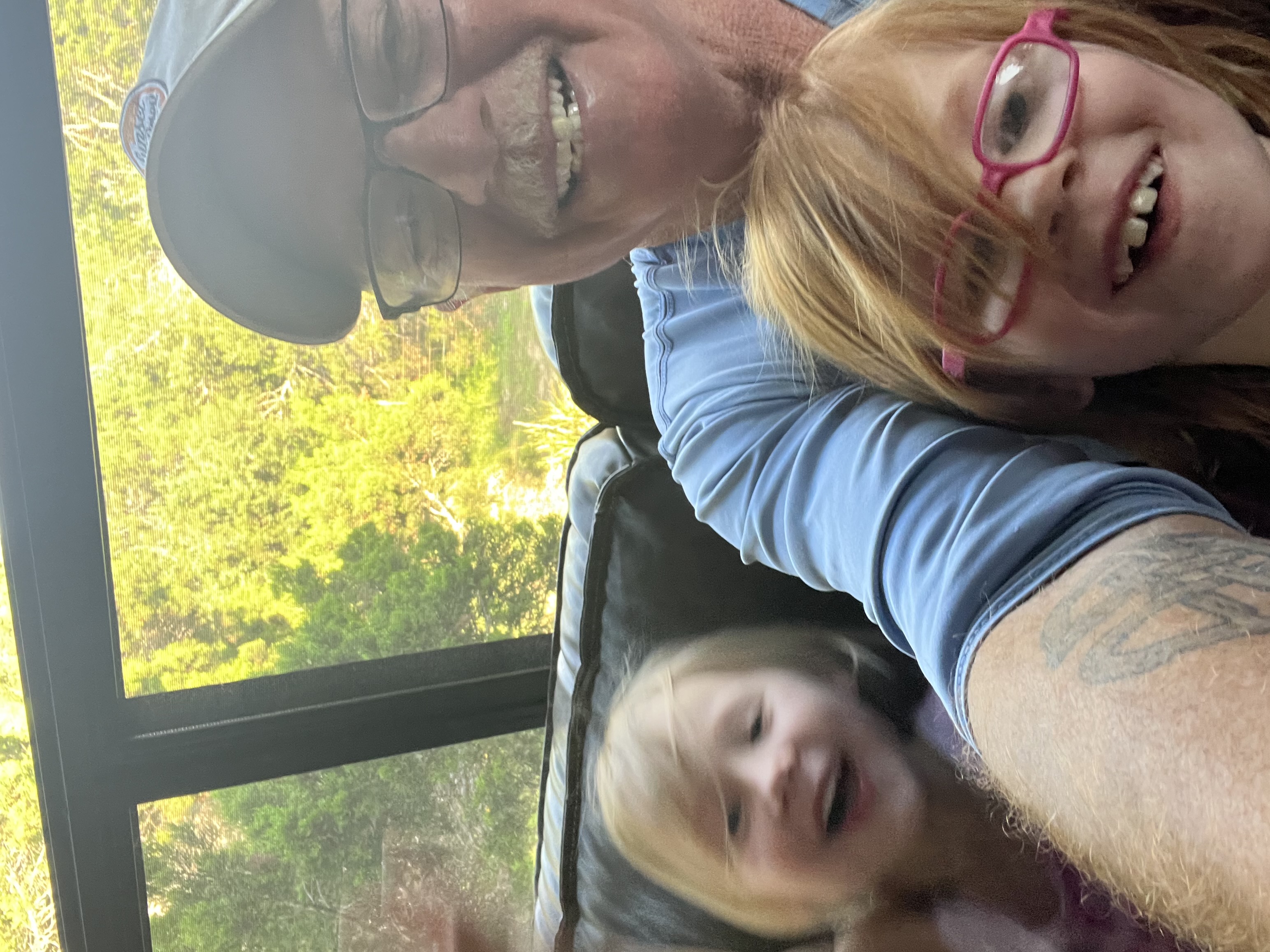 Marine corps Veteran Jeffrey with his grandkids smiling