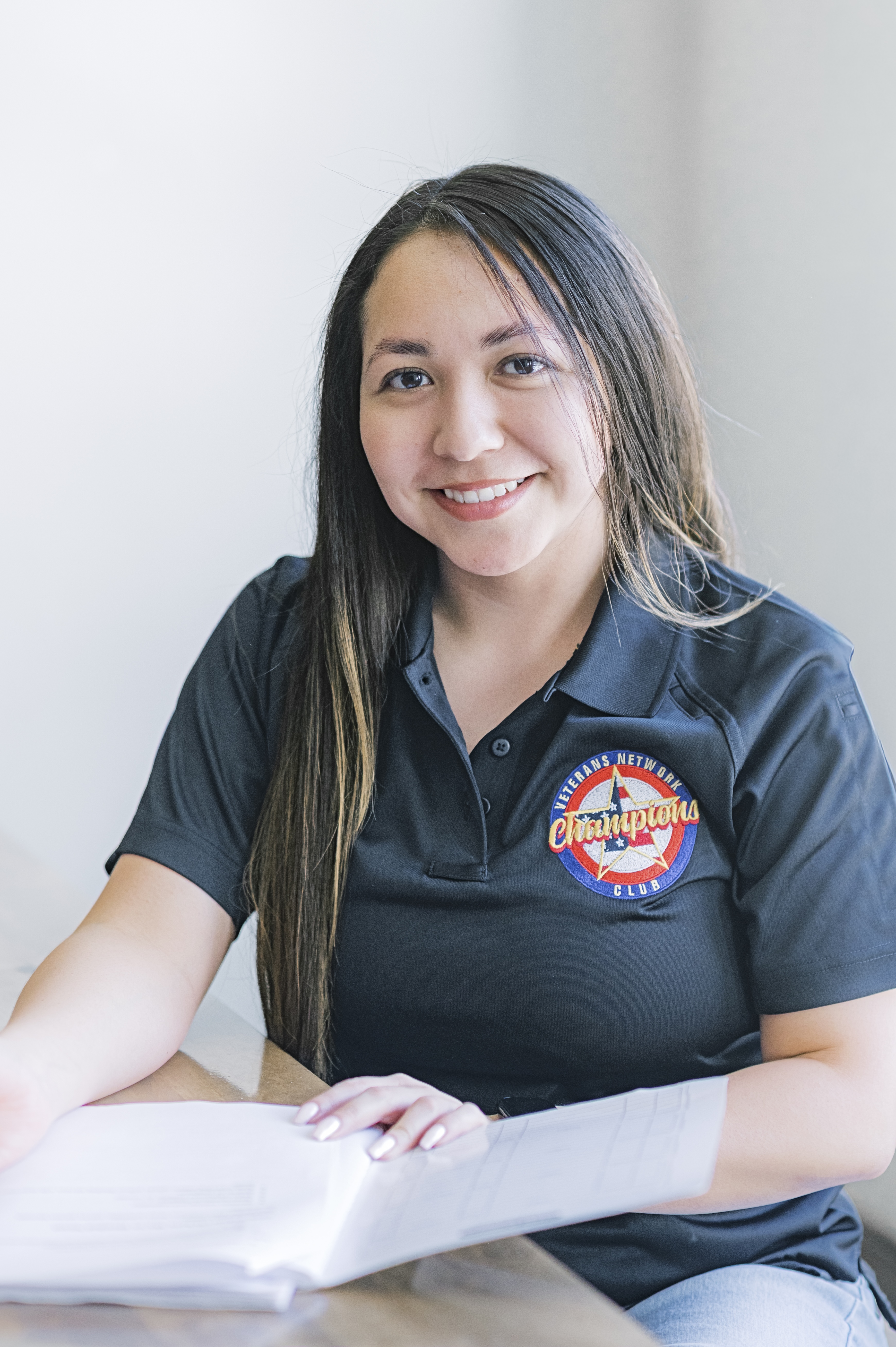 headshot picture of Maria with VNCC team shirt 